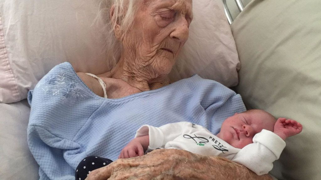 A 101-year-old woman celebrates motherhood